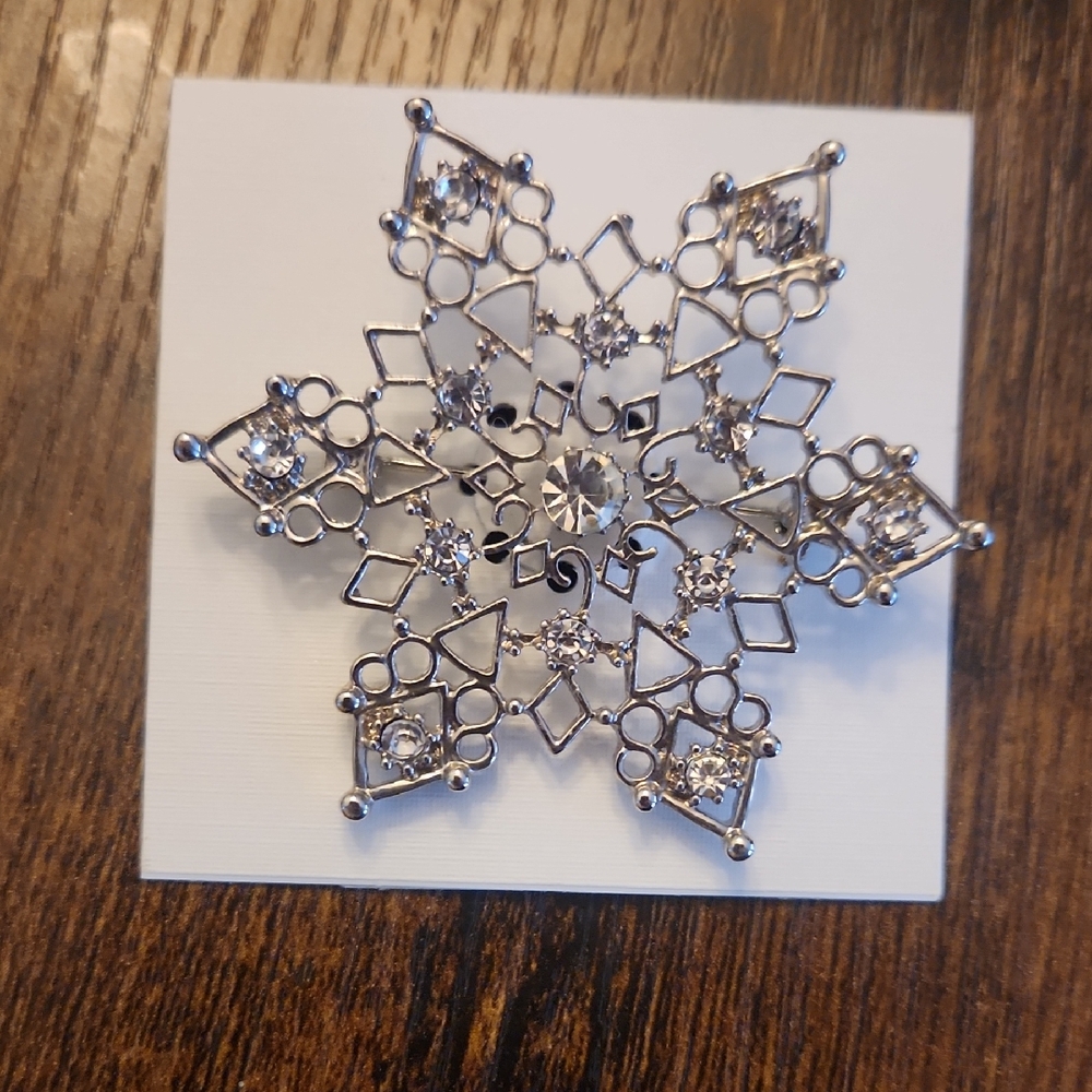 Elegant Silver Snowflake Brooch With Clear Crystals